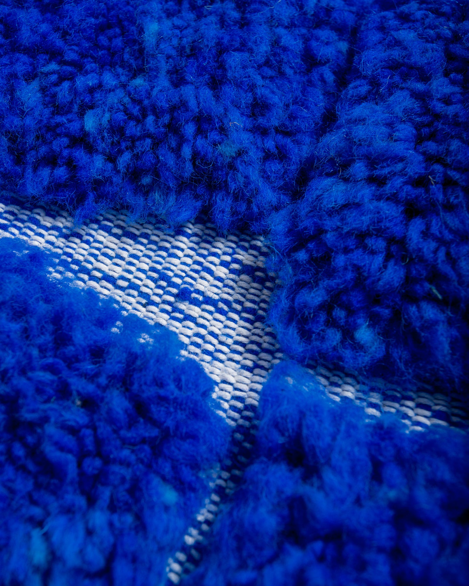 Modern, designer, handcrafted Berber rug from Morocco. Beniourain carpet with beautiful colours and patterns and fluffy wool texture.
